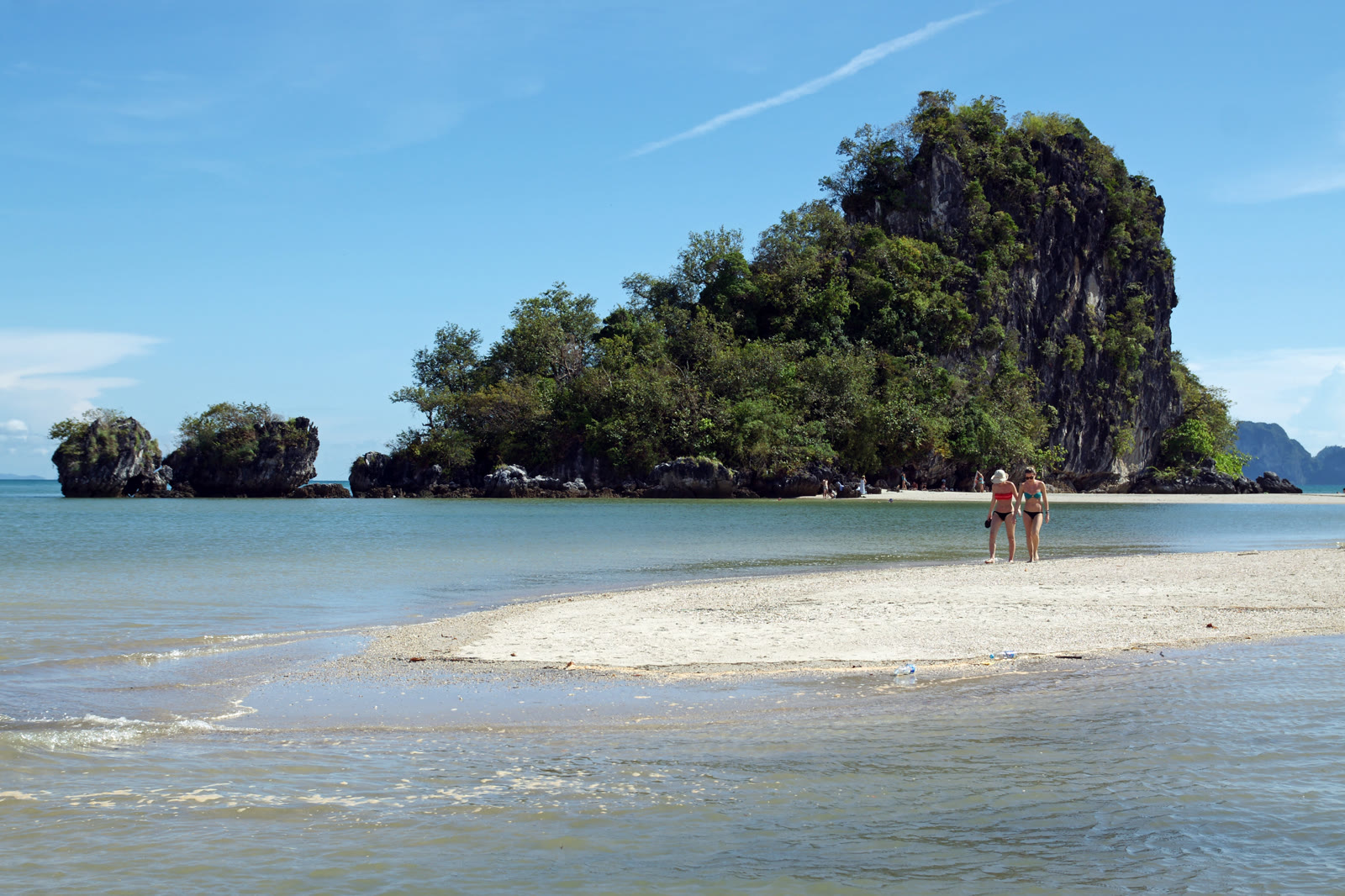 Hat Noppharat Thara beach in Ao Nang, the mainland shore of Hat Noppharat Thara–Mu Ko Phi Phi National Park, with limestone offshore