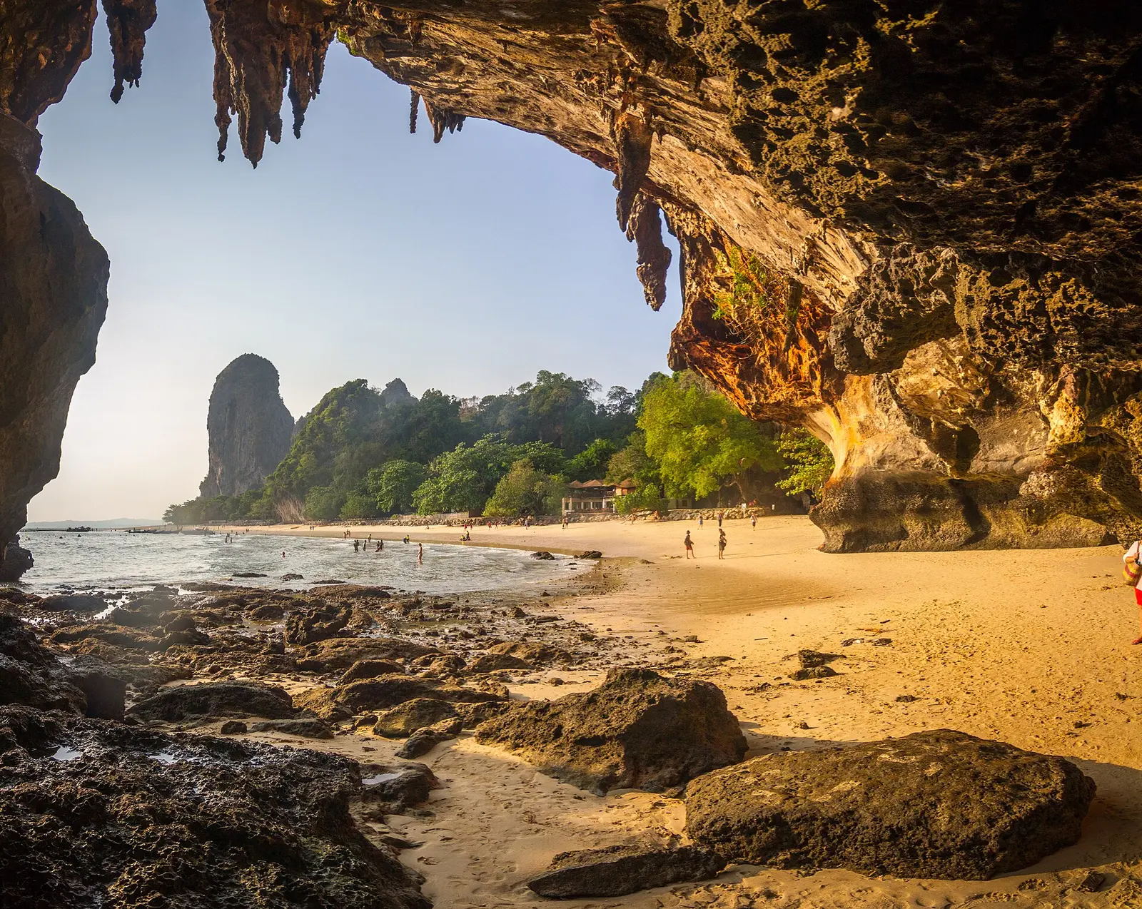 Phra Nang beach at Railay, the sand in front of Princess Cave, with limestone cliffs at the end of the bay