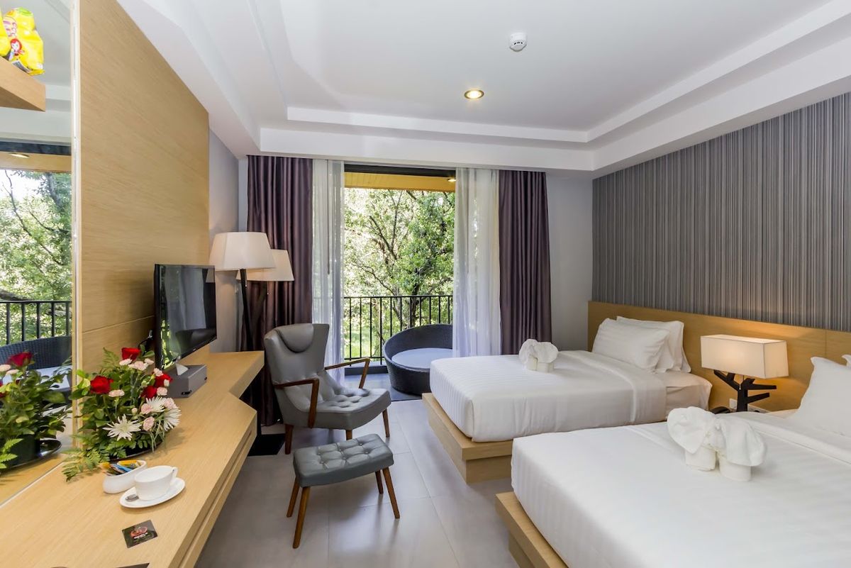 Apple A Day Resort Krabi (SHA Extra Plus Certified) pool and grounds in Krabi Town