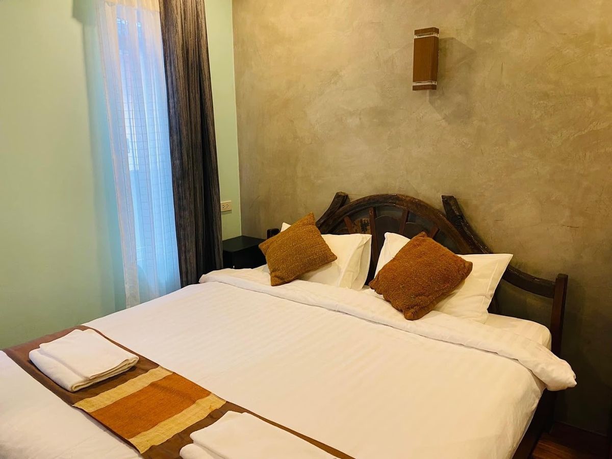 Boutique Village Hotel บูติค วิลเลจ โฮเทล pool and grounds in Tubkaek