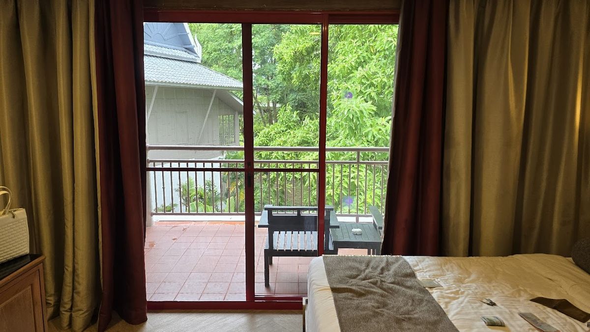 Chada Thai Village Resort pool and grounds in Krabi Town