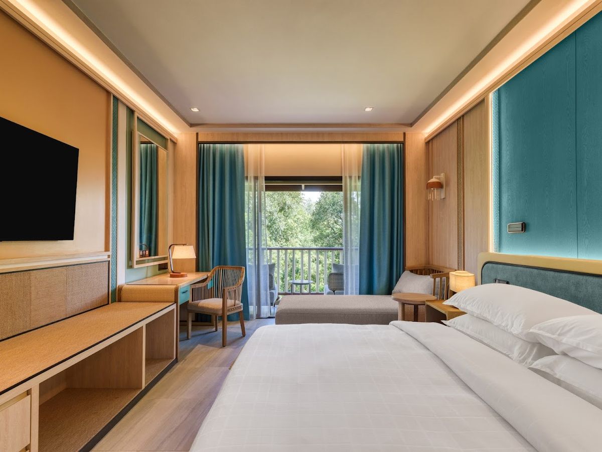 Dusit Thani Krabi Beach Resort pool and grounds in Klong Muang
