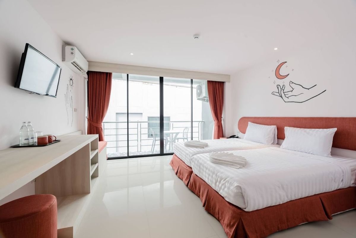 Moon Budget Hotel pool and grounds in Krabi Town