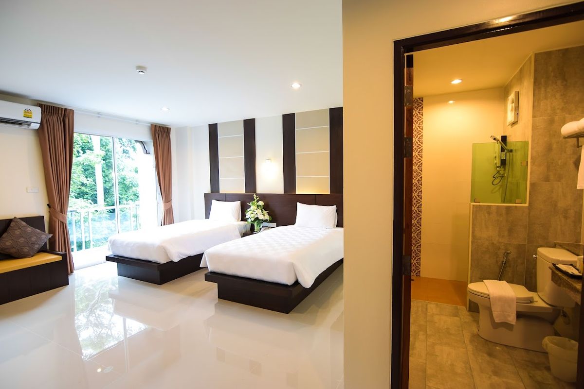 Peak Boutique House pool and grounds in Krabi Town