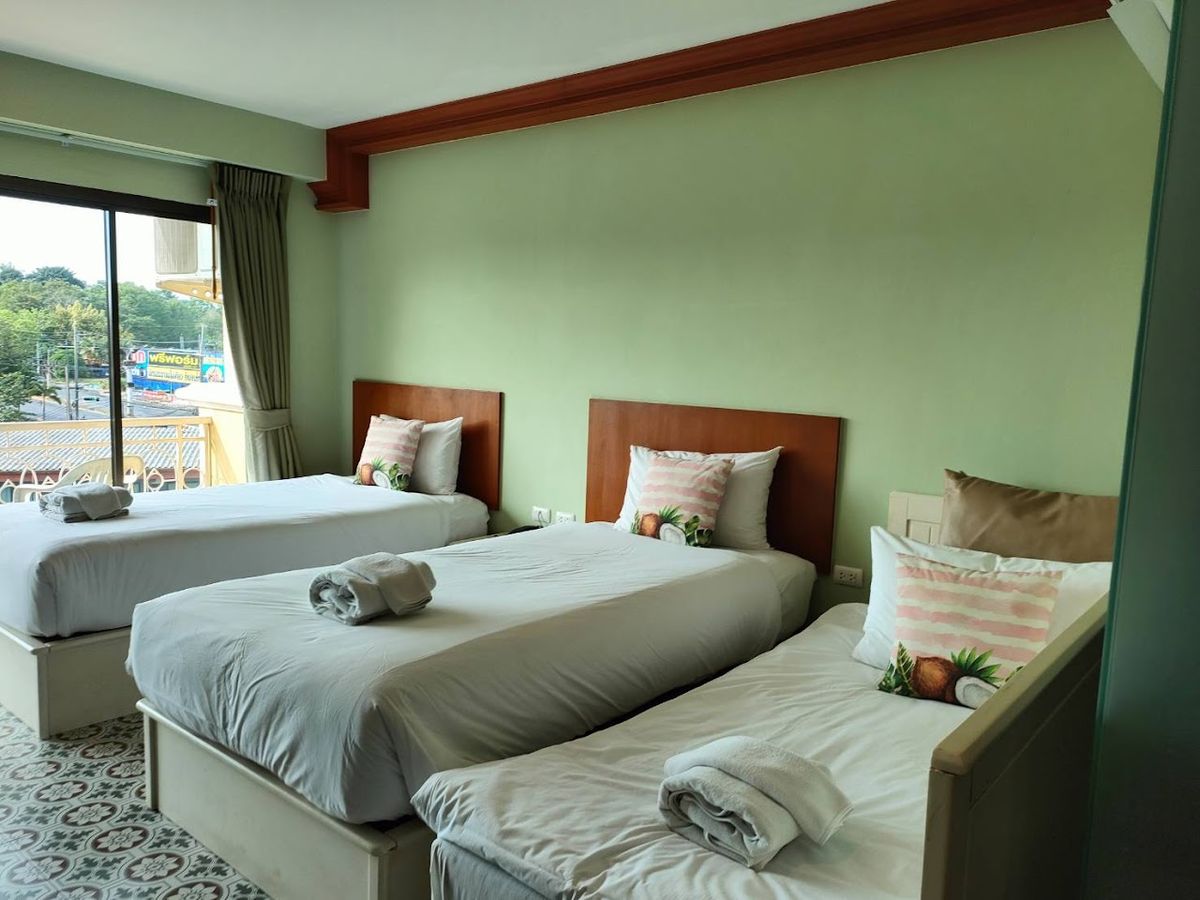 ROYAL PINEAPPLE HOTEL | a welcome to wealth & good fortune pool and grounds in Krabi Town