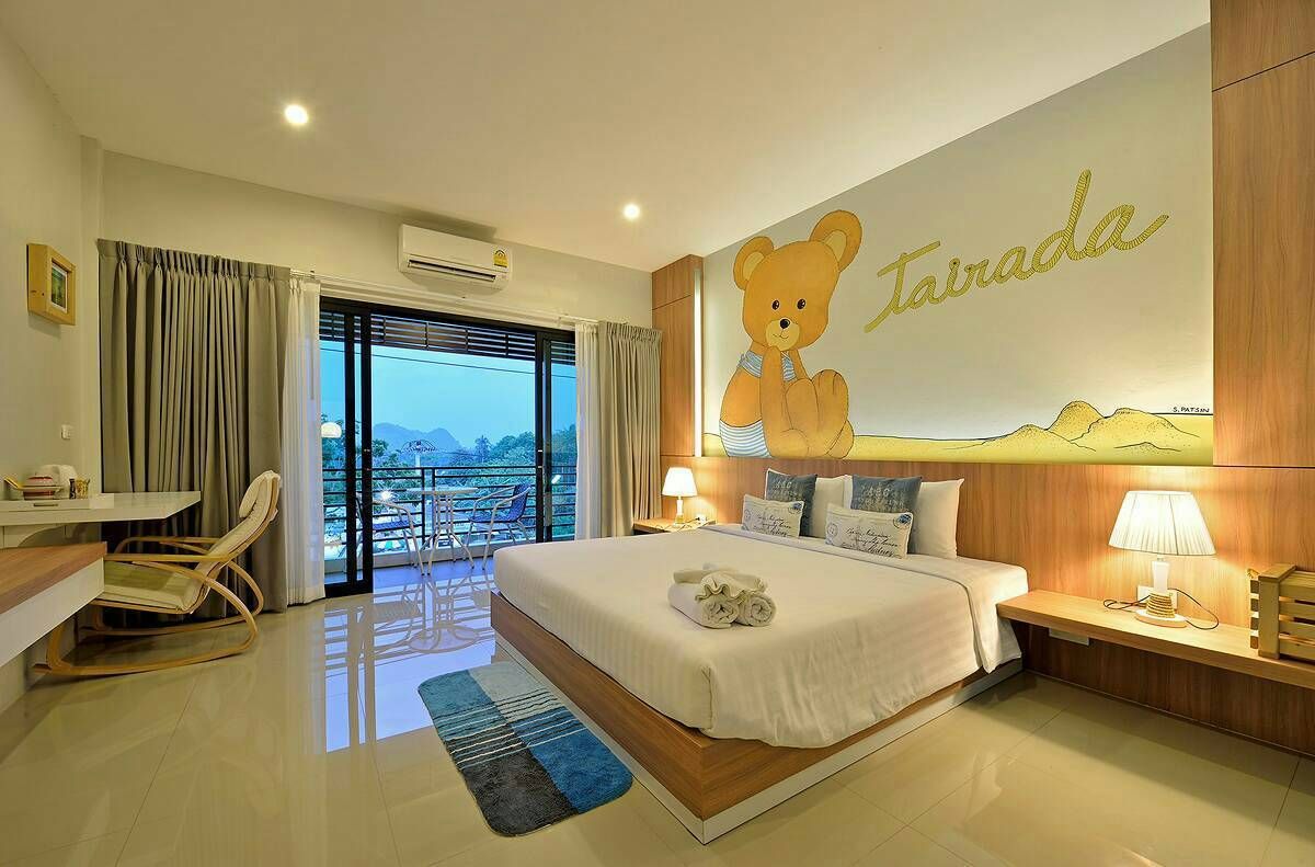 Tairada Boutique Hotel pool and grounds in Krabi Town
